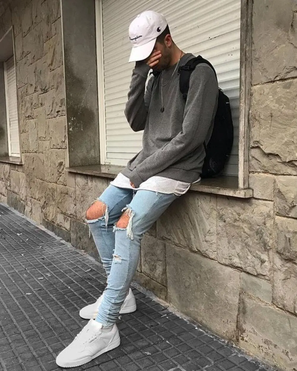 Baseball Cap + Sweatshirt + Distressed Jeans