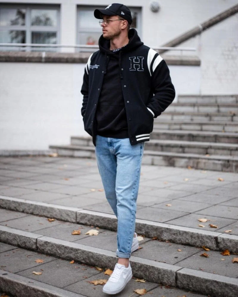 Layering a Hoodie with a Bomber Jacket and Jeans